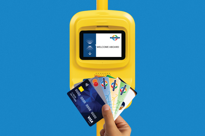 A yellow Adelaide Metro validator with a hand holding a visa card, mastercard, seniors card and all metroCARD types in a fan shape